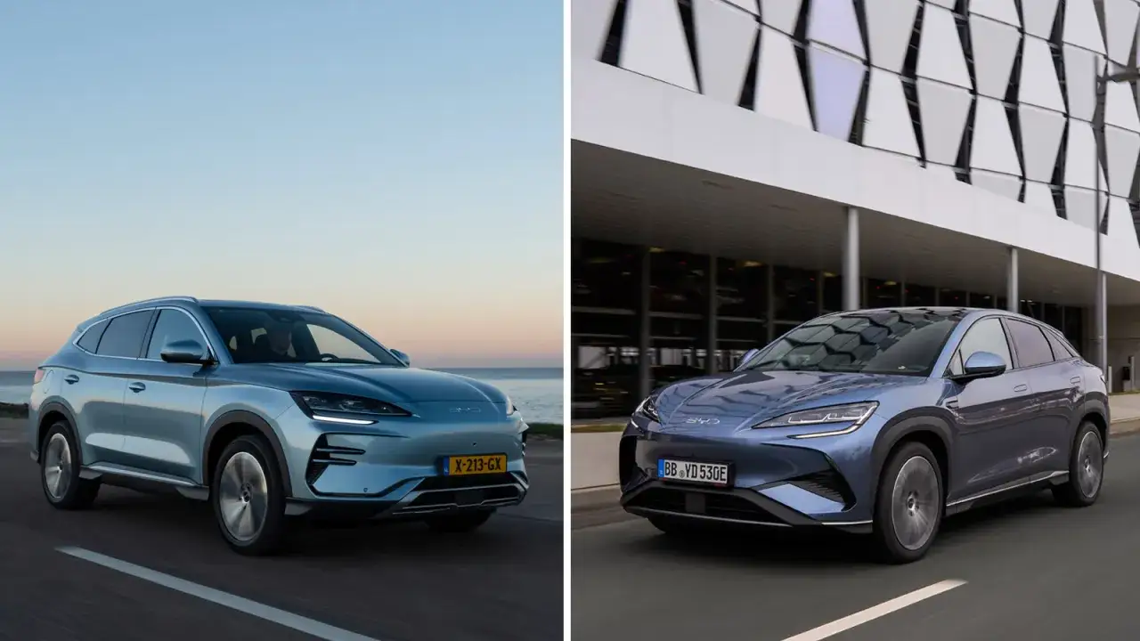 Dwa eleganckie BYD Sealion 7 w różnych odcieniach niebieskiego, jeden na tle morza, drugi przy nowoczesnym budynku.